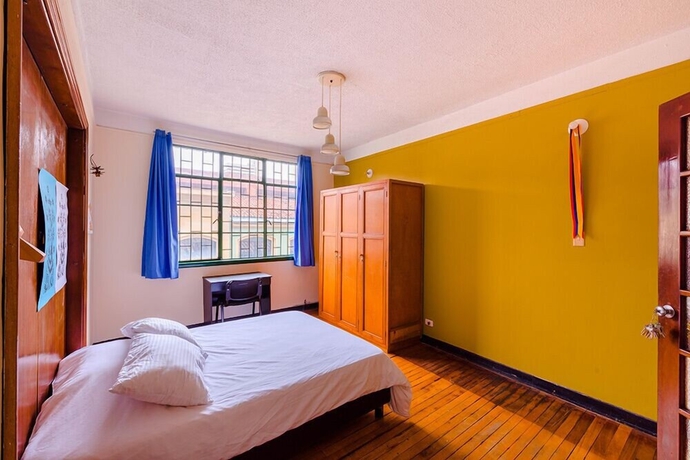 Imagen de la habitación del Hotel La Quinta - Hostel. Foto 5