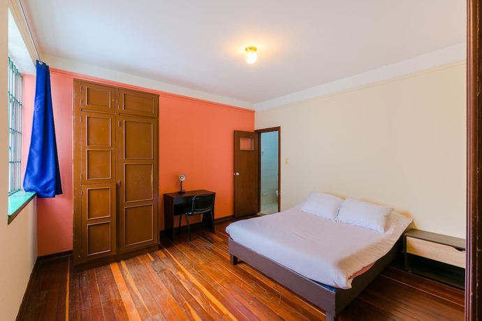 Imagen de la habitación del Hotel La Quinta - Hostel. Foto 7