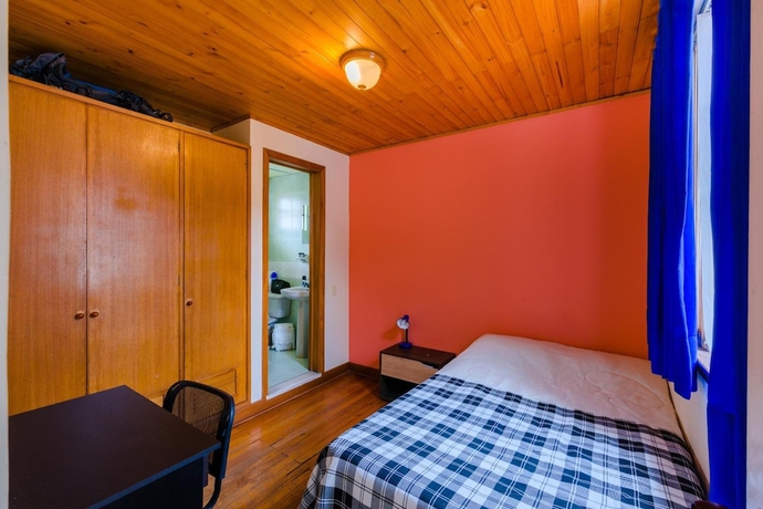 Imagen de la habitación del Hotel La Quinta - Hostel. Foto 8