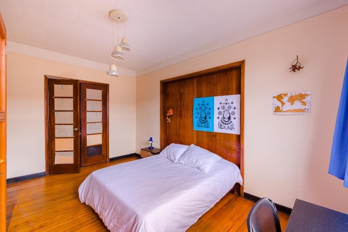 Imagen de la habitación del Hotel La Quinta - Hostel. Foto 13