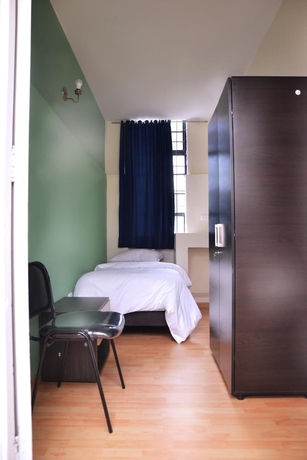 Imagen de la habitación del Hotel La Quinta - Hostel. Foto 14