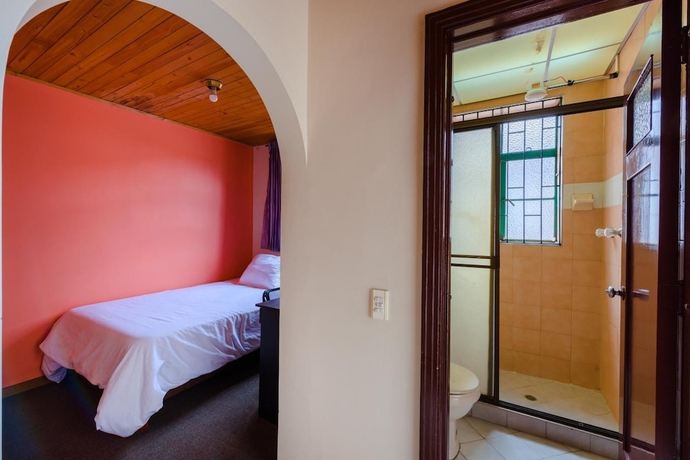Imagen de la habitación del Hotel La Quinta - Hostel. Foto 18