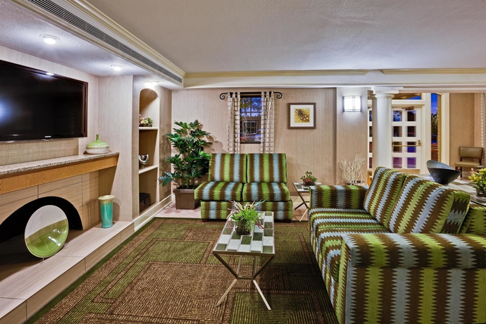 Imagen de los interiores del Hotel La Quinta Inn By Wyndham Orlando Airport West. Foto 10