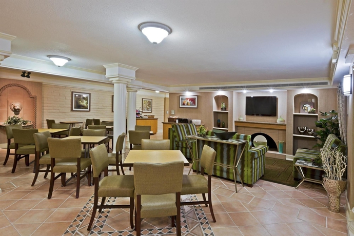 Imagen del bar/restaurante del Hotel La Quinta Inn By Wyndham Orlando Airport West. Foto 3