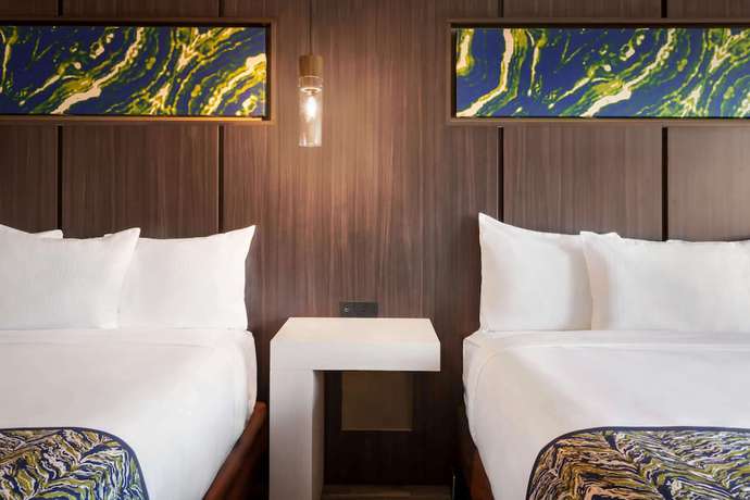 Imagen de la habitación del Hotel La Quinta Inn & Suites by Wyndham Orlando IDrive Theme Parks. Foto 13