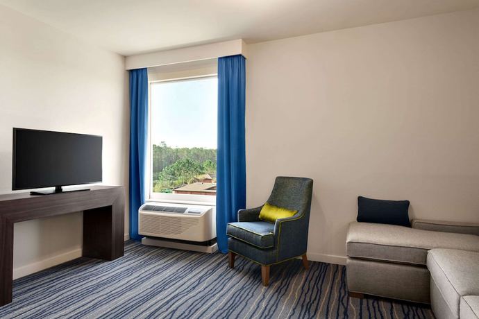 Imagen de la habitación del Hotel La Quinta Inn & Suites by Wyndham Orlando IDrive Theme Parks. Foto 14