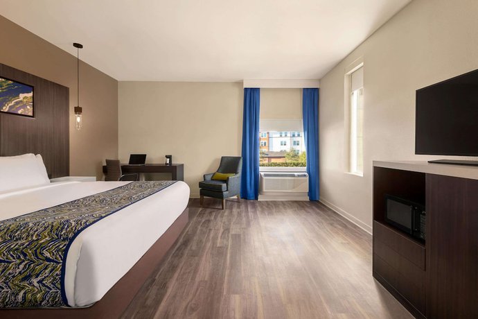 Imagen de la habitación del Hotel La Quinta Inn & Suites by Wyndham Orlando IDrive Theme Parks. Foto 18