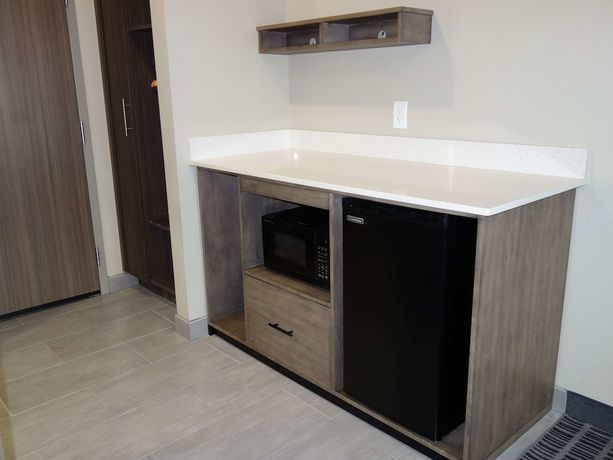 Imagen de la habitación del Hotel La Quinta Inn and Suites by Wyndham San Antonio Alamo City. Foto 8