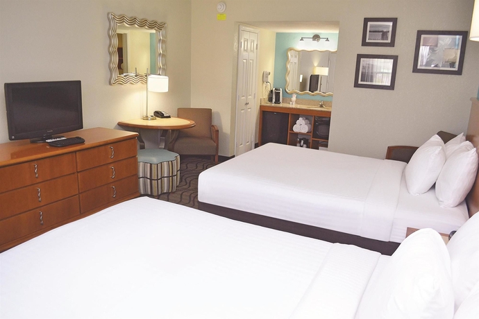 Imagen de la habitación del Hotel La Quinta Inn by Wyndham Cocoa Beach-Port Canaveral. Foto 11