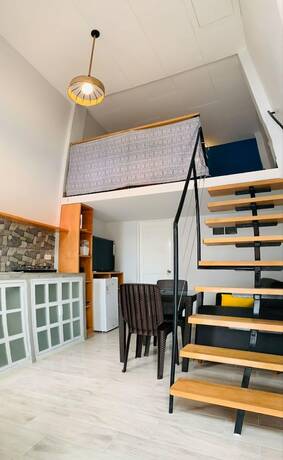 Imagen de la habitación del Hotel La Quinta Loft Apartments. Foto 8
