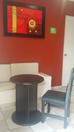 Imagen de la habitación del Hotel La Quinta Puebla. Foto 11