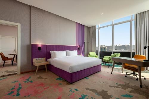 Imagen de la habitación del Hotel La Quinta by Wyndham Abu Dhabi Al Wahda. Foto 13