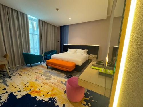 Imagen de la habitación del Hotel La Quinta by Wyndham Abu Dhabi Al Wahda. Foto 19