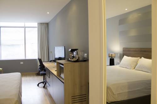 Imagen de la habitación del Hotel La Quinta by Wyndham Medellin. Foto 7