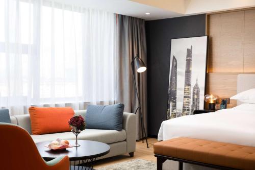 Imagen de la habitación del Hotel La Quinta by Wyndham Qionghai Yinhai. Foto 14