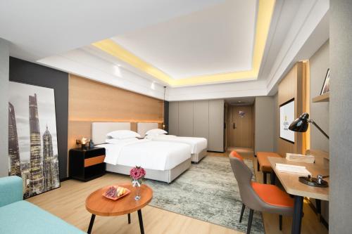 Imagen de la habitación del Hotel La Quinta by Wyndham Qionghai Yinhai. Foto 18