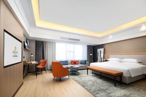 Imagen de la habitación del Hotel La Quinta by Wyndham Qionghai Yinhai. Foto 19