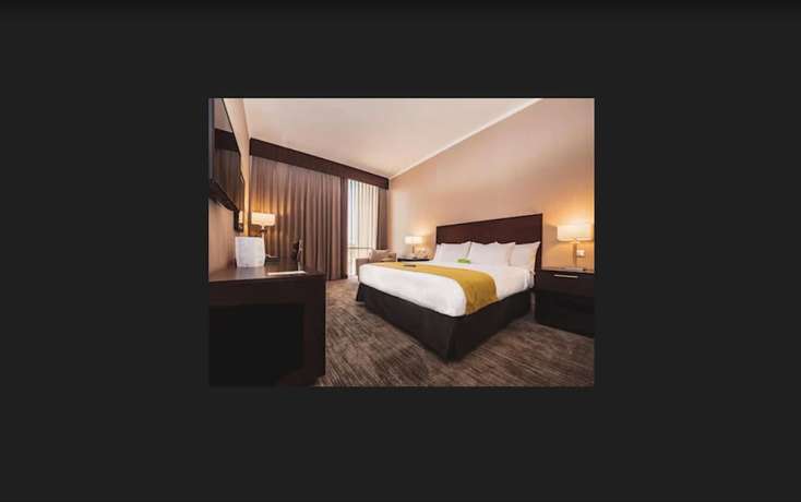 Imagen de la habitación del Hotel La Quinta by Wyndham Santiago Aeropuerto. Foto 2