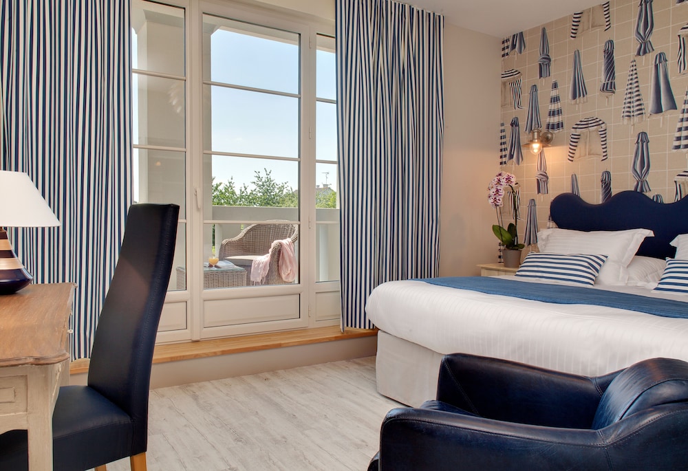 Imagen de la habitación del Hotel La Ramade. Foto 11