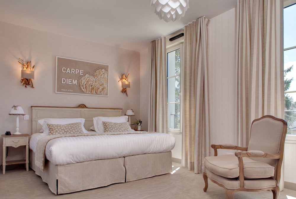 Imagen de la habitación del Hotel La Ramade. Foto 12