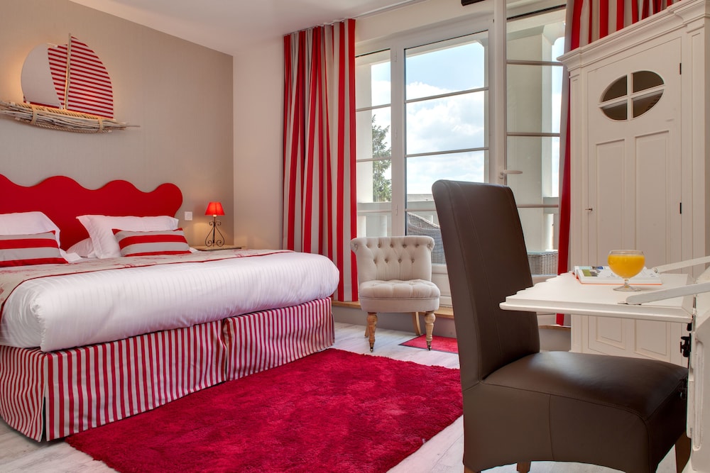 Imagen de la habitación del Hotel La Ramade. Foto 19