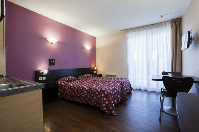 Imagen de la habitación del Hotel La R&eacute;sidence Le Grand T&eacute;tras. Foto 12