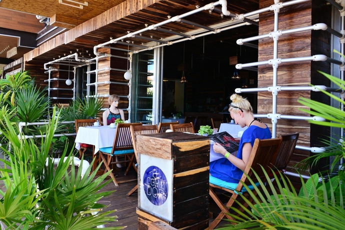 Imagen del bar/restaurante del Hotel La Reina Roja Boutique. Foto 2