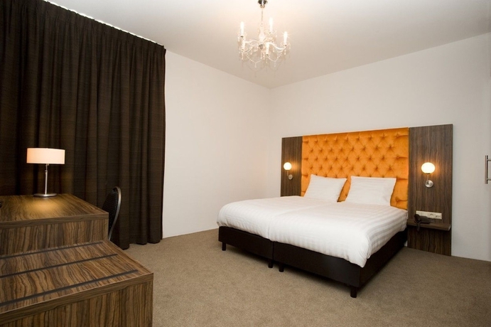 Imagen de la habitación del Hotel La Reine. Foto 10