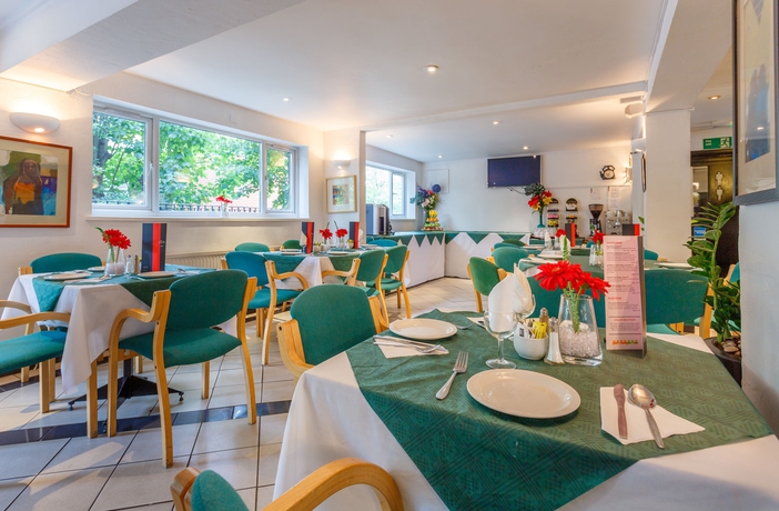 Imagen del bar/restaurante del Hotel La Reserve, Londres. Foto 6