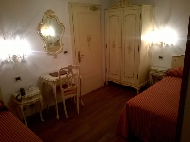 Imagen de la habitación del Hotel La Residenza, Lido di Venezia. Foto 8