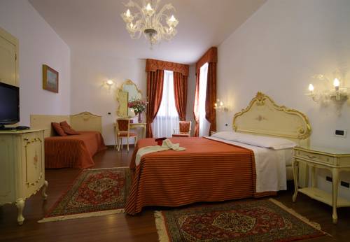 Imagen de la habitación del Hotel La Residenza, Venecia. Foto 7