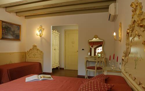 Imagen de la habitación del Hotel La Residenza, Venecia. Foto 13