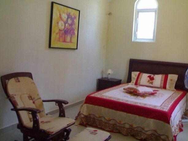 Imagen de la habitación del Hotel La Residnce les Badamiers. Foto 8