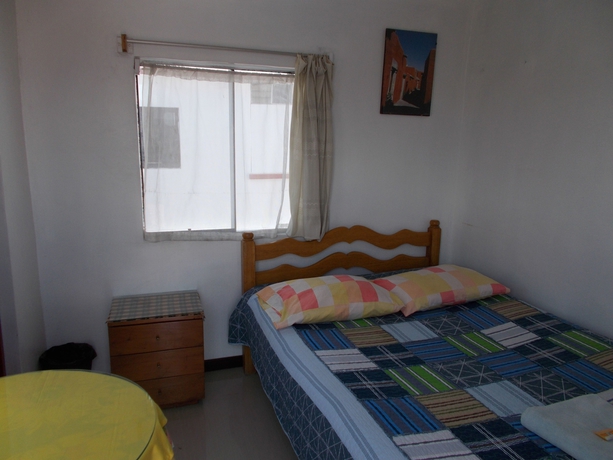 Imagen de la habitación del Hotel La Reyna. Foto 7