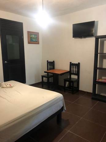 Imagen de la habitación del Hotel La Roca. Foto 11