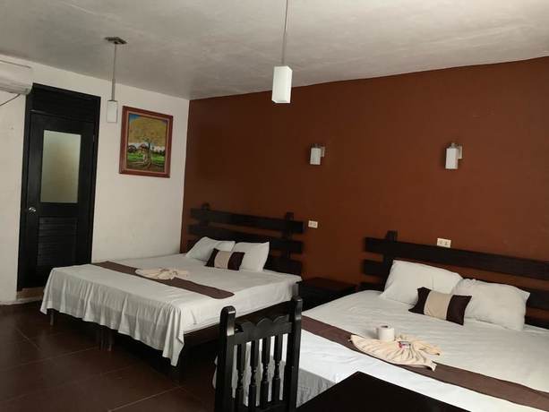 Imagen de la habitación del Hotel La Roca. Foto 12