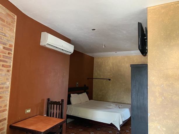 Imagen de la habitación del Hotel La Roca. Foto 14