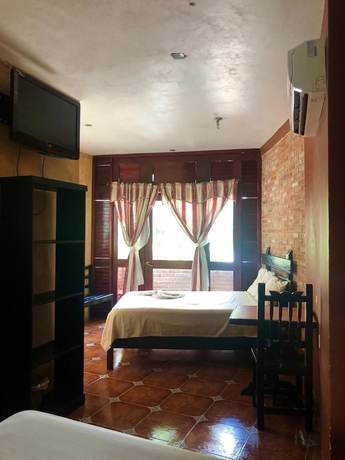 Imagen de la habitación del Hotel La Roca. Foto 16