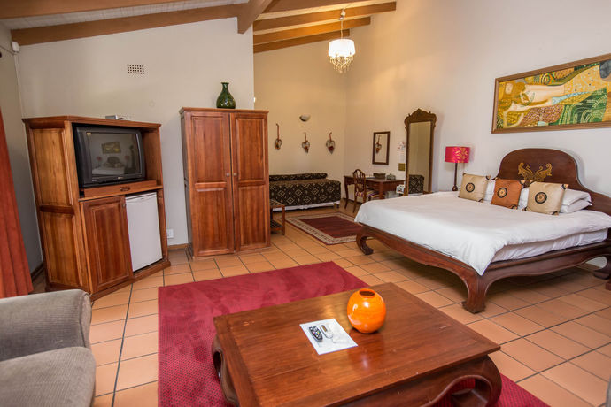 Imagen de la habitación del Hotel La Roca Guest House. Foto 4