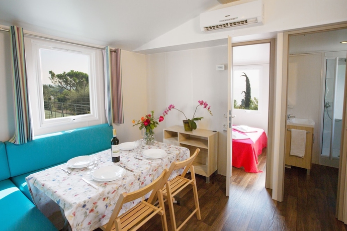 Imagen de la habitación del Hotel La Rocca Camping Village. Foto 4