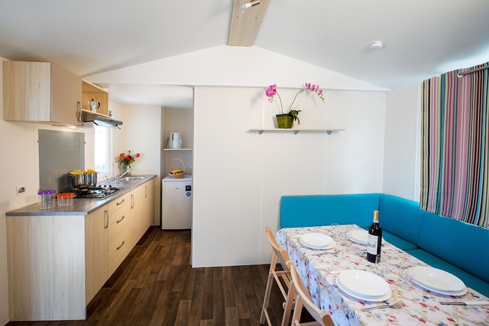 Imagen de la habitación del Hotel La Rocca Camping Village. Foto 5