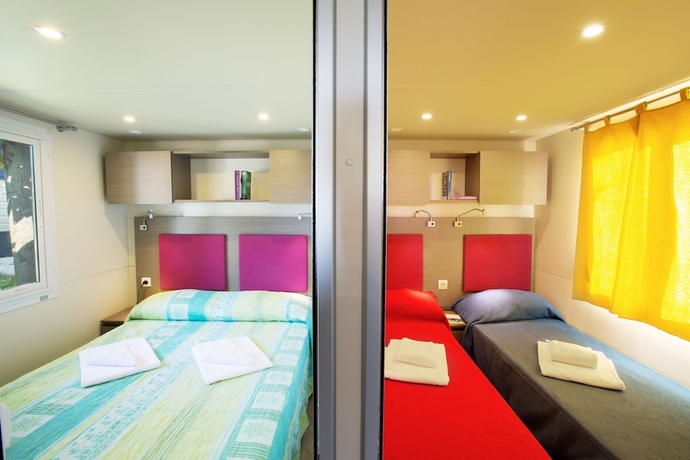 Imagen de la habitación del Hotel La Rocca Camping Village. Foto 17