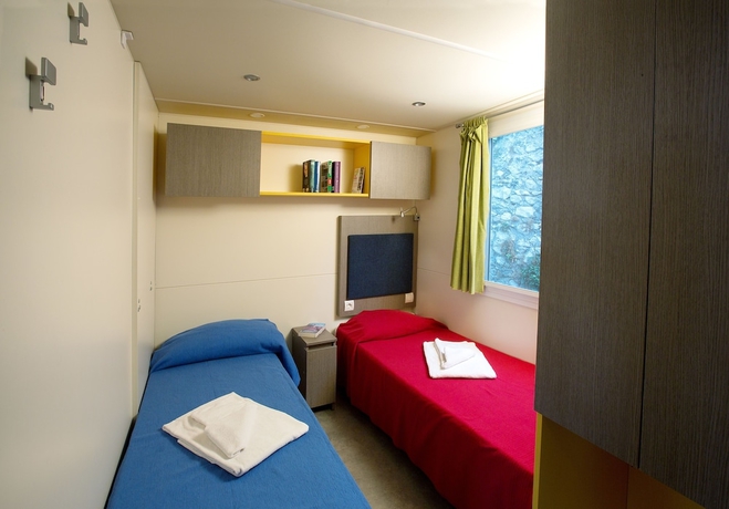Imagen de la habitación del Hotel La Rocca Camping Village. Foto 18