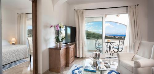 Imagen de la habitación del Hotel La Rocca Resort & Spa. Foto 7