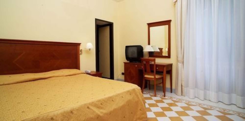Imagen de la habitación del Hotel La Rondinella. Foto 8