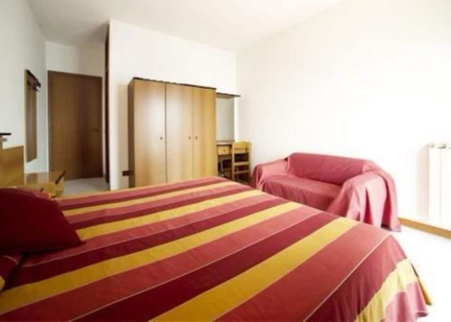 Imagen de la habitación del Hotel La Rondinella. Foto 12