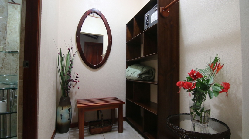 Imagen de la habitación del Hotel La Rosa De America. Foto 11