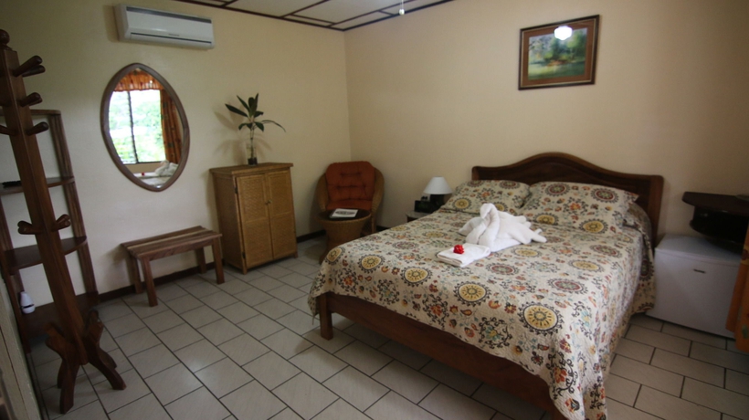 Imagen de la habitación del Hotel La Rosa De America. Foto 13