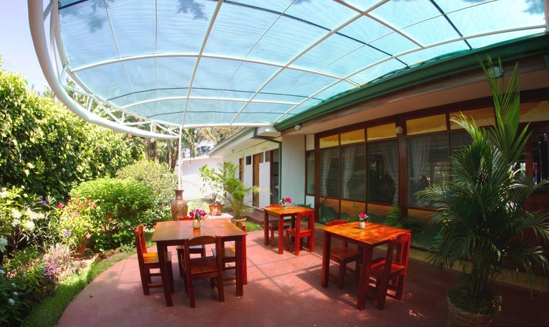 Imagen del bar/restaurante del Hotel La Rosa De America. Foto 7