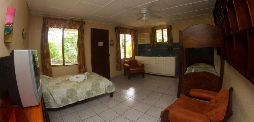 Imagen de la habitación del Hotel La Rosa De America. Foto 16